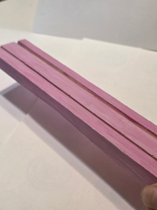 Ceramic resin display stand.