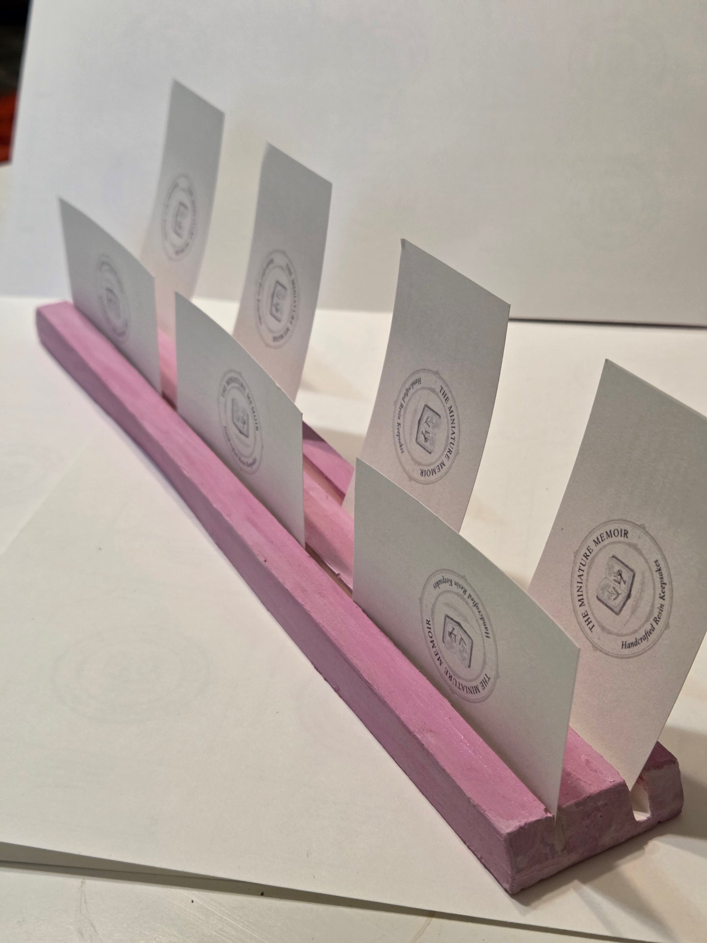 Ceramic resin display stand.