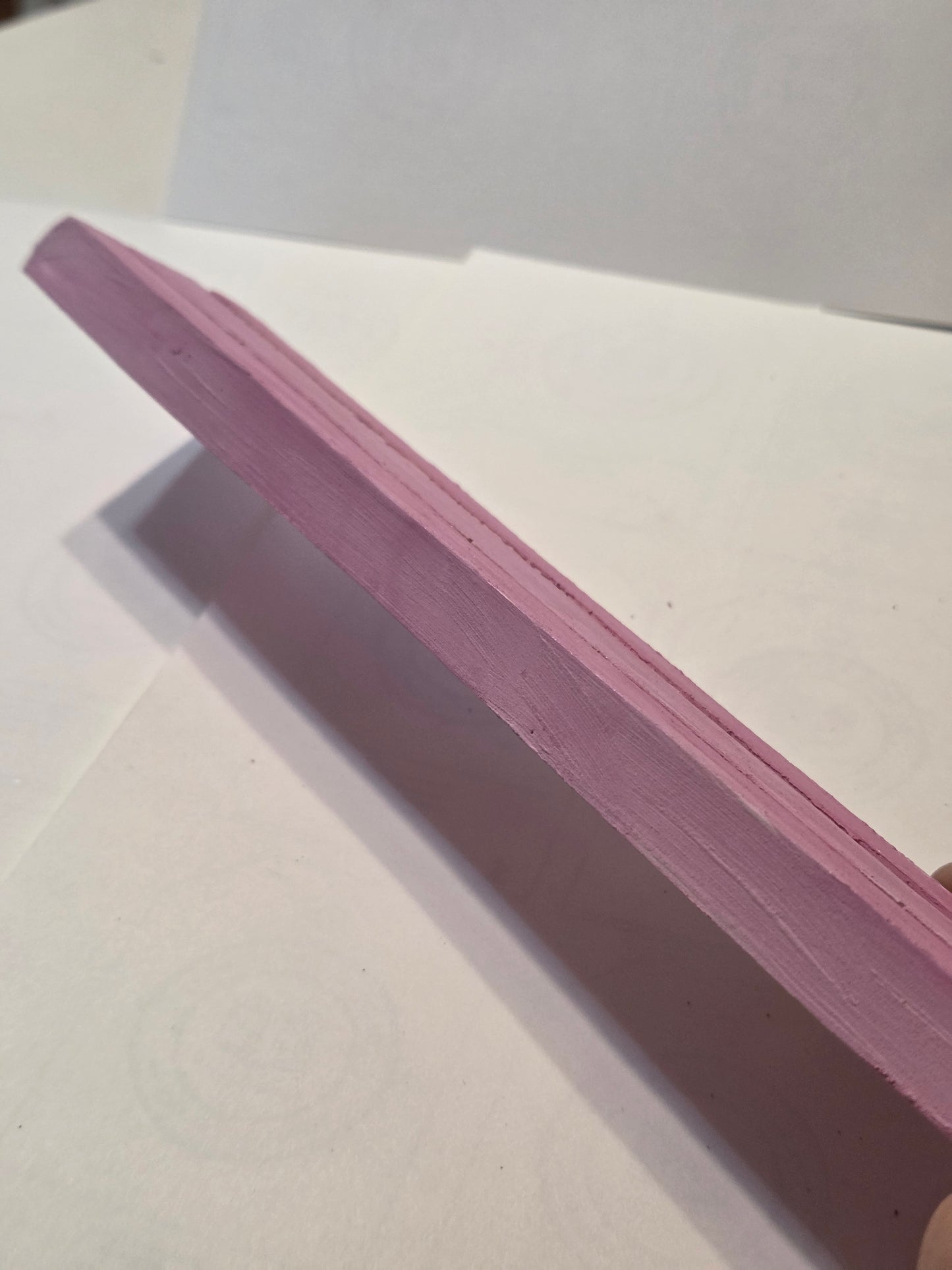 Ceramic resin display stand.