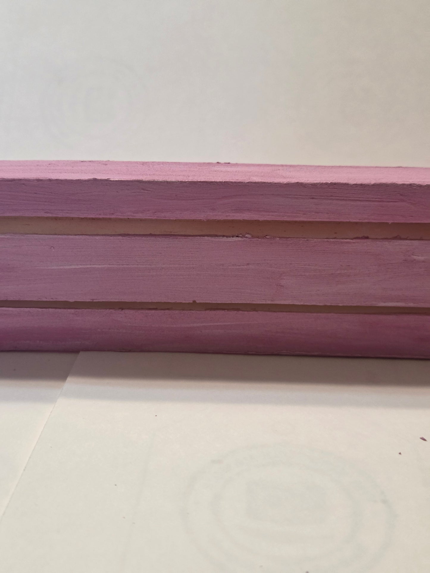 Ceramic resin display stand.