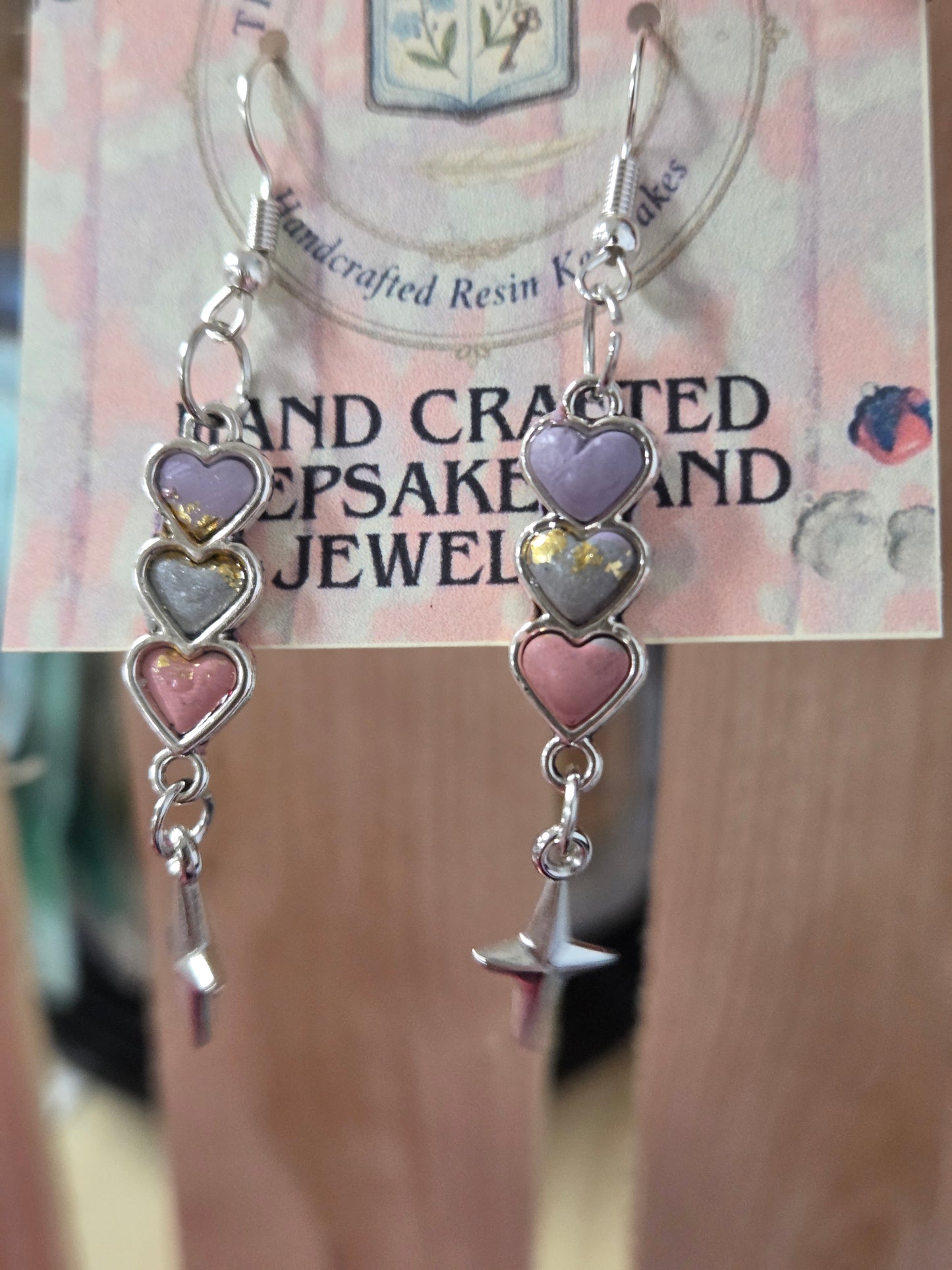 Layered love heart dangles.