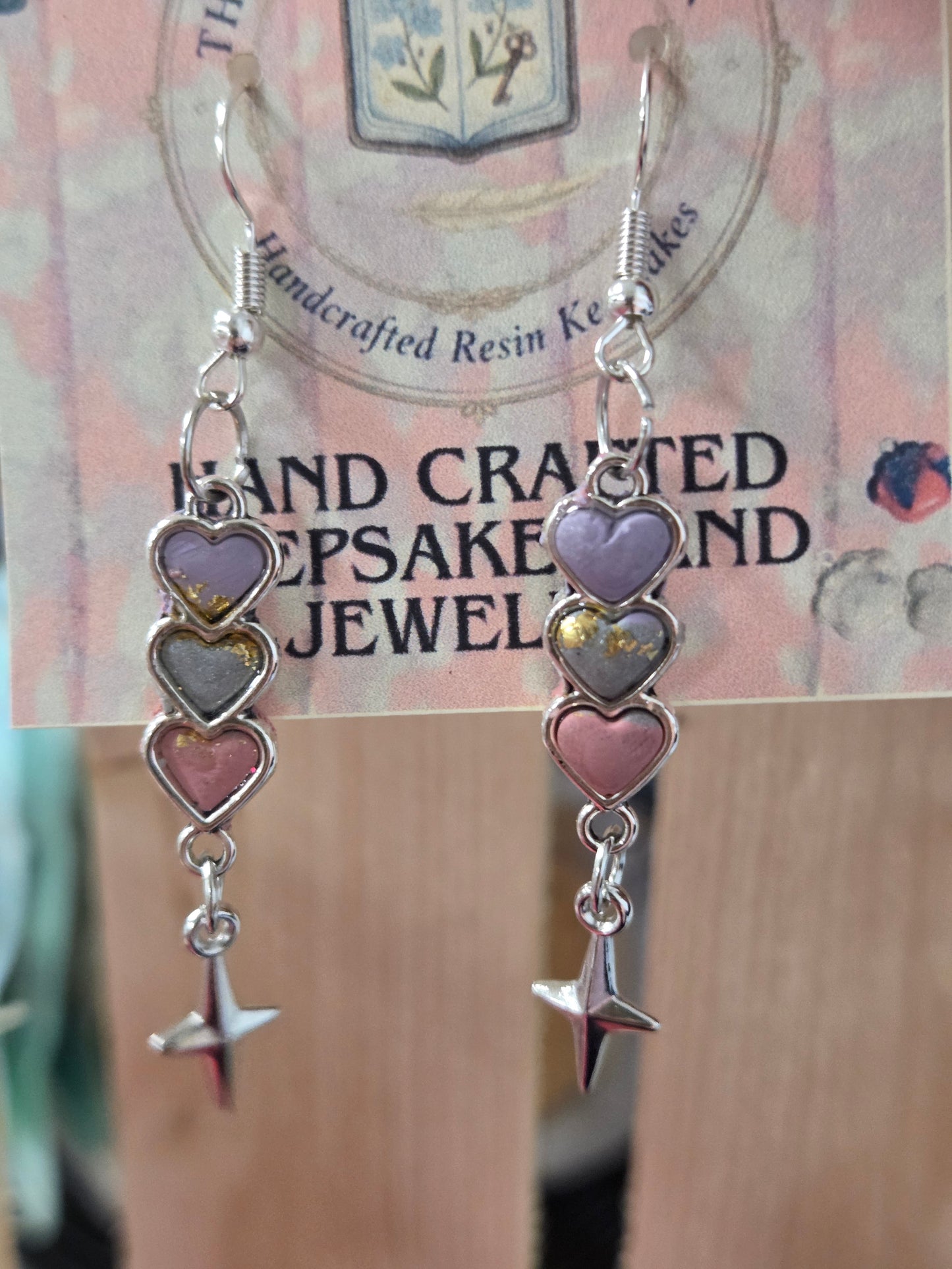 Layered love heart dangles.