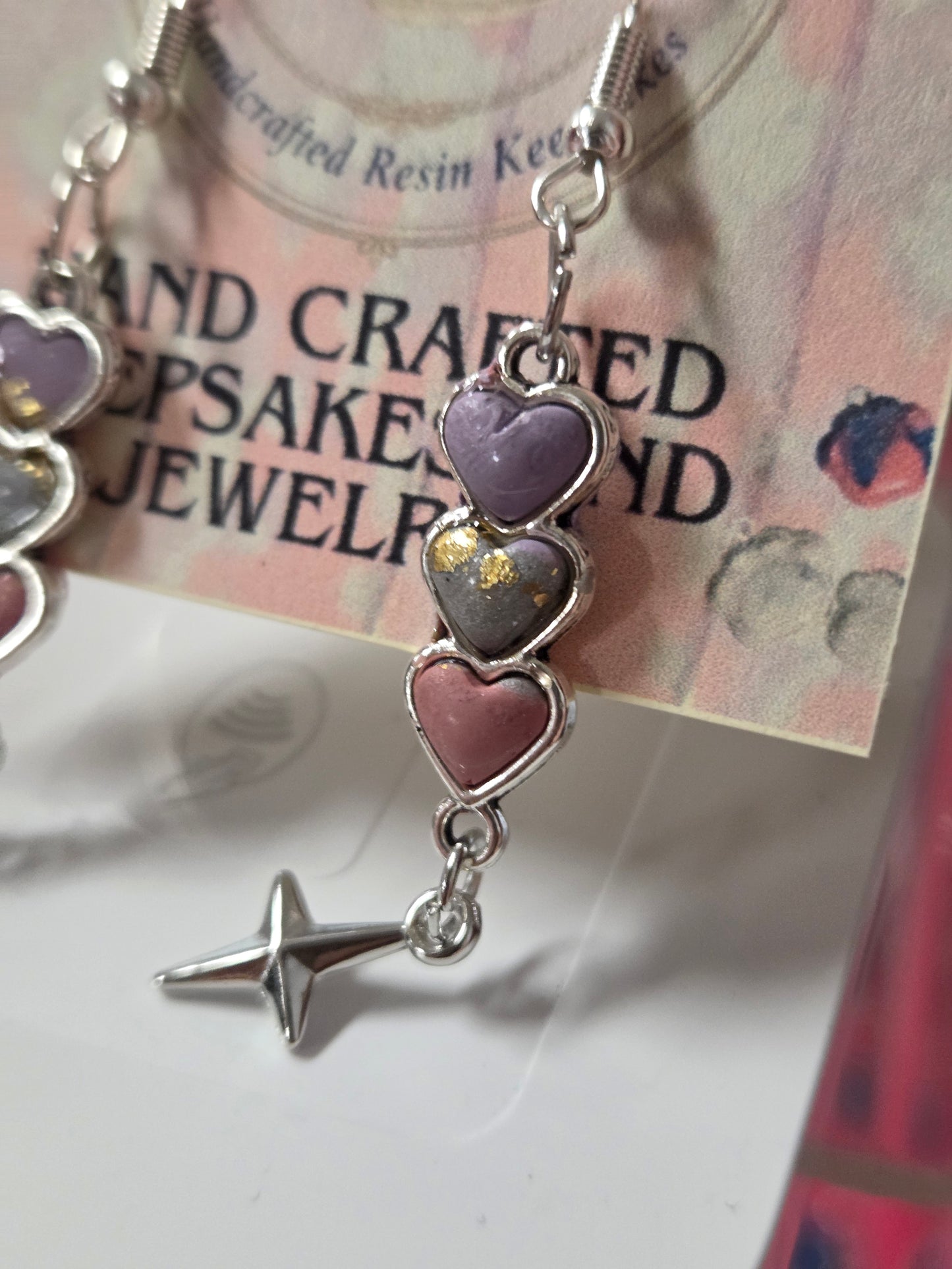 Layered love heart dangles.
