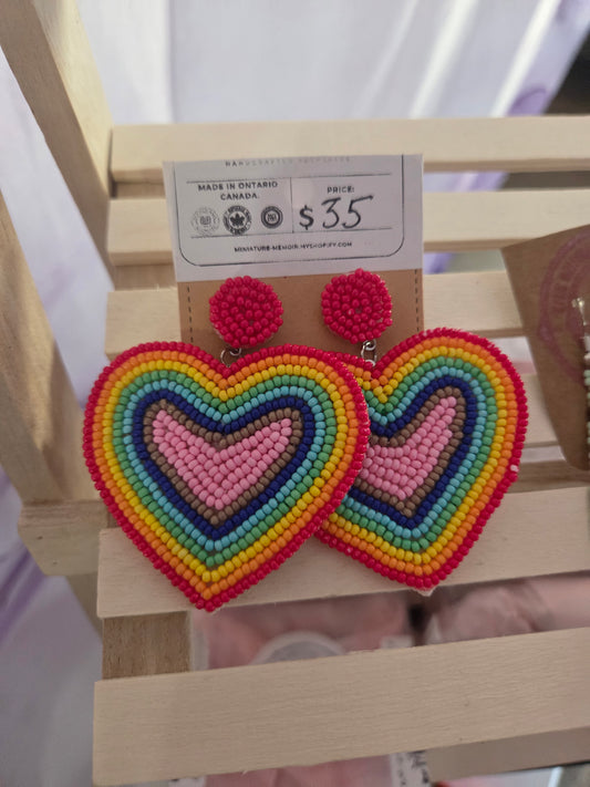Rainbow heart beaded earrings.