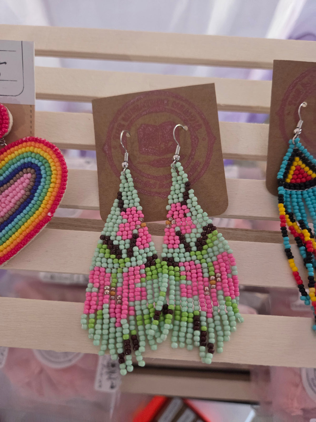 Beaded daisy dangle earrings